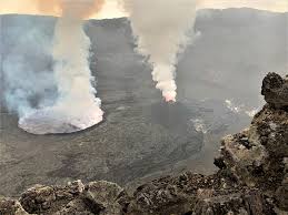 Nyiragongo is a stratovolcano in the dr congo with a deep summit crater containing a lava lake and a small active cone. The Active Summit Crater Of The Nyiragongo Volcano Contains A Lava Lake Download Scientific Diagram