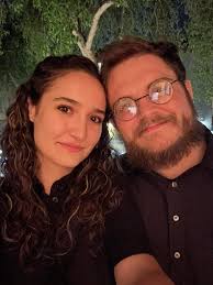 Can someone please take out the little in blue and take glare out of his  framed picture 🙏🏼