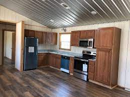 wild rose photos general shelters of texas in 2021 small cabin kitchens shed homes cabin kitchens