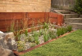 Melbourne Water Encourages Australian Citizens To Build 10 000 Rain Gardens Rain Garden Design Rain Garden Garden Planter Boxes
