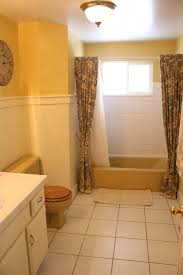 Mustard Yellow Tub And Toilet Updated Bathroom Yellow Bathrooms Brown Bathroom Bathroom Color Schemes