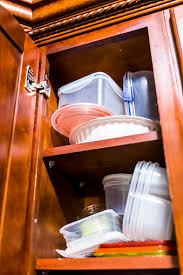 open wooden kitchen cabinet door