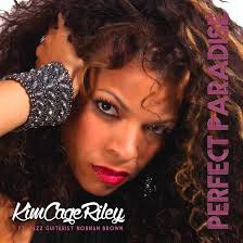 Perfect Paradise: Riley, Kim Cage: Amazon.in: Music}
