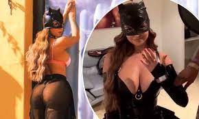 Demi Rose sizzles in VERY busty latex catsuit | Daily Mail Online