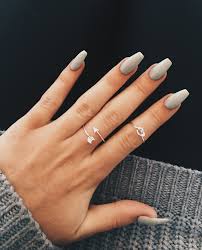 These coffin nails are painted in a bold matte blue. Grey Acrylic Nails Byktramshaw Oval Acrylic Nails Graduation Nails Grey Acrylic Nails