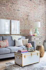Wicker trunks can serve as hidden storage as well as attractive coffee tables. 16 Old Trunks Turned Coffee Tables That Bring Extra Storage And Character
