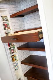 The most common pull down shelf material is wood. Diy Built In Pantry Shelves With Pull Out Drawers Pantry Shelving System