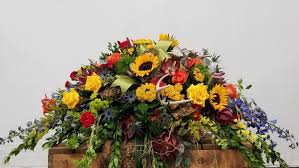 When choosing casket sprays for women, pink and purple flowers are an option. Custom Casket Spray For Men By Arlene S Flowers And Gifts