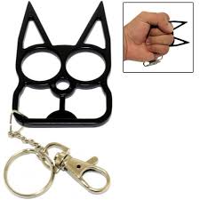This unique black cat defensive keychain packs a sharp punch! Cat Self Defense Keychain Knuckle Weapon The Home Security Superstore