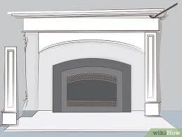 You can use a screwdriver or chisel to help pry the surround away from the wall if it's stuck in place. How To Remove A Fireplace Insert With Pictures Wikihow