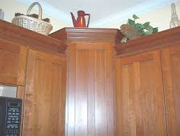 Add crown molding to kitchen cabinets for an updated look. Installing Kitchen Cabinet Crown Molding Fine Homebuilding