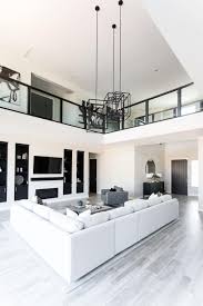 What size stand do i need for my tv? Black And White Living Space With Built Ins Hgtv