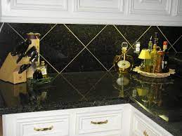 It's much nicer than 12x12 tiles yet much last expe. 12x12 Granite Diagonal Tile On Backsplash Stone Tile Backsplash Tile Backsplash White Subway Tile Backsplash