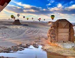al ula on instagram breathtaking photo for the largest tomb in madain saleh and the air balloons thank to the photog places to travel photo places to visit