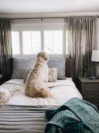 Plantation shutter in bedroom done by majestic curtains and blinds. Cozying Up The House With Shutters The Inspired Room