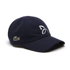 An oversized crocodile and an exclusive novak djokovic logo bring a distinctive touch to this microfiber cap. Buy Lacoste Novak Djokovic Cap Dark Blue White Online Tennis Point