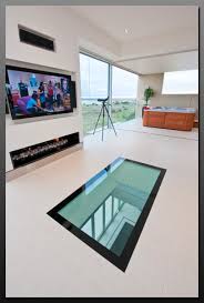 A clear glass floor can impress with its transparency and creative displays that can be arranged under glass panels. Glass Floors Stairs Residential Commercial Design Palmers Glass