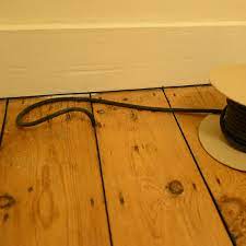 Insert the sliver in a gap and tap it in with a hammer until it sits firmly. Draughtex Floorboard Gap Filler For Draught Proofing Floors