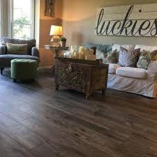 Laminate flooring in mocha hickory 12.33mm thickness $1,29/sqft. 75 Beautiful Vinyl Floor Living Room Pictures Ideas July 2021 Houzz