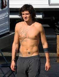 Blooms tattoos are all relatively small, discreet, and have meaning. Pin On Actor Orlando Bloom