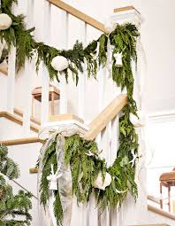 As pretty as they are when they're decorating your home's banisters and adorning the tree, when christmas decorations are no longer on display, they become a fragile, bulky storage nightmare. Christmas Decorating For Staircases