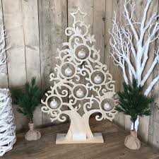Check spelling or type a new query. Designer Detailed Cut Out Wood Christmas Tree Cowshed Interiors