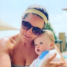 Snuggles 🥰 🤗 #snuggles #pool #swimming #pooltime #sun #funinthesun #mom  #love #preciousmoments #precious #family #mama #babyblues #hugs #familytime  #catchingrays #fitfam