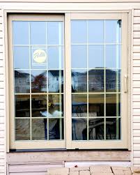 So confused on which brands of windows to go with. Valdicass Inc Pella Lifestyle Series Tan Exterior And White Interior Sliding Door With Grilles Between The Glass And Satin Nickel Hardware Meet Another Customer Satisfaction Pellainspired Remodeling Renovation Customhomes