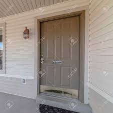 American architectural automatic door push plate switches. Square Covered Front Porch With Grey And White Decor And A Wooden Stock Photo Picture And Royalty Free Image Image 137688944