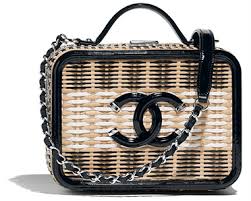 Off white/beige python embossed and leather cambon cigarette case holder. Chic By The Seashore Goop