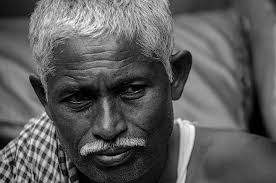 Self portrait in mirror of an autorickshaw Kerala,India(autorickshaw is  called tuk-tuk in some other countries)