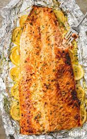 Garlic Butter Baked Salmon The Easiest Way To Feed A Crowd Recipe Salmon Fillet Recipes Baked Salmon Recipes Healthy Baked Salmon
