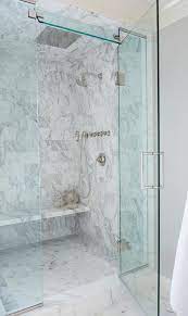 Master Bath Shower Features A Marble Clad Ceiling And Walls Lined With A Floating Marble Shower Be Master Bath Shower Beautiful Bathroom Designs Marble Showers