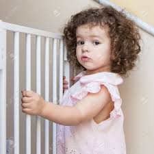 There's nothing like us out there. Portrait Of A Cute Curly Hair Girl Near Stair Gate Stock Photo Picture And Royalty Free Image Image 34233649