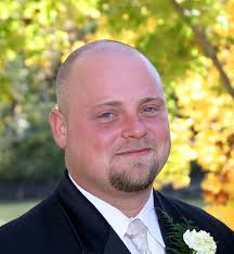 Jess P. Surman, Jr., age 42, formerly...