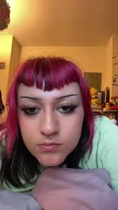 Girl with Red Hair Stops and Looks at Camera