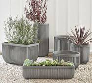 New hand painted green leaf printed ceramic planters. Outdoor Planters Patio Planters Plant Pots Pottery Barn