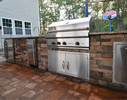 Barbecue grills, fire bowls, burners, beverage coolers, doors, hoods, ice makers, ovens, refrigerators, sinks, smokers, tables and food warmers are offered. Outdoor Kitchen With Wolf Grill Ice Maker Fridge Sink Roll Out Garbage Diy Outdoor Kitchen Outdoor Kitchen Outdoor Kitchen Bars