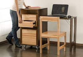Transforming Cabinet With Hidden Table And Chairs From Claudio Sibille Living In A Shoebox Portable Tiny Houses Small Office Furniture