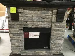 Sei furniture gallatin faux stone electric bookcases fireplace, satin black. Home Decorators Collection Highland 40 In Media Console Electric Fireplace Tv Stand In Faux Stone Gray Open Box In Like New Condition Kx Real Deals Hastings Tools Housewares And More Auction
