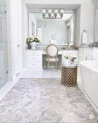 White bathroom design ideas with antique white vanity cabinets and antique bronze framed mirrors. White Vanity Bathroom Design Ideas Trendecors