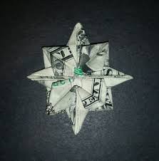 Money origami is fun to give as a gift throughout the year, but this money origami tree is especially appropriate for christmas. How To Make A Origami Christmas Star With Money Make It Easy Crafts Easy Money Folded Five Pointed