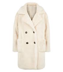 With oversized arms and pockets, this teddy bear coat is perfect for topping off a slouchy, casual weekend outfit. Pink Vanilla Cream Double Breasted Teddy Coat New Look