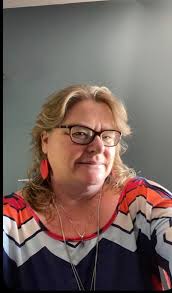 Watching Eurovision & Switzerland is wearing Kath's pumpkin shrug.