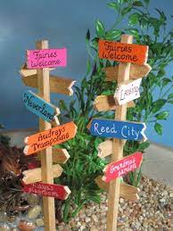 For today, we had fun designing and building the garden (a worthy goal in and of itself). Signpost For Fairy Gardens Ooak Handmade Etsy Miniature Fairy Gardens Fairy Garden Diy Fairy Garden Furniture