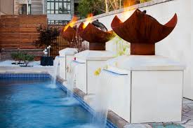 The plaza fountain at bluember restaurant in rancho mirage, ca was one of the first to incorporate my firebowls. Fire Features And Fountains Add Amazing Light Effects To Montreal Pool John T Unger