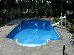 They are secured by pool coping strips. Traditional Styles Aqua Tech Swimming Pools Inground Swimming Pools Backyard Swimming Pools