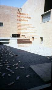 Hector pieterson being carried by mbuyisa makhubo. Window Opening Onto A Memorial Courtyard With Scattered Bricks Download Scientific Diagram