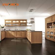 After sanding,all surfaces are vacuumed to eliminate dust particles. China Cheap Factory Direct Modern Simple Design Solid Wood Kitchen Cabinet China Solid Wood Kitchen Cabinet Classic Kitchen Cabinet