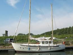 Chart storage is provided under the port 9 37 settee. Fisher 37 Ketch